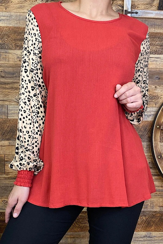 Burnt Orange top with cheetah sleeves